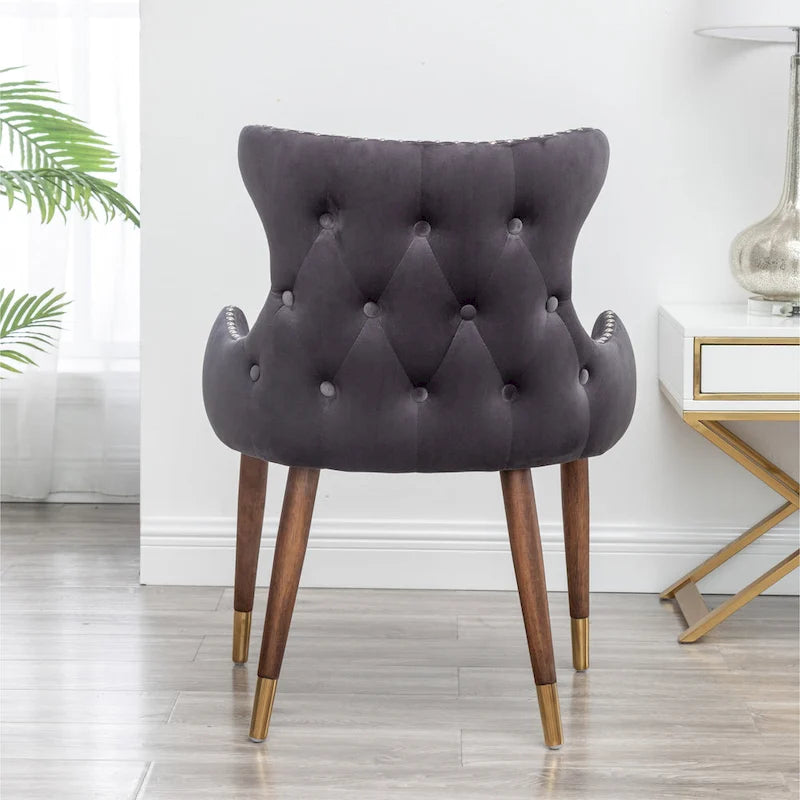 Poltrona d'accento rivestita in poliestere grigio con gambe in legno di gomma