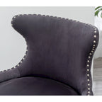 Poltrona d'accento rivestita in poliestere grigio con gambe in legno di gomma