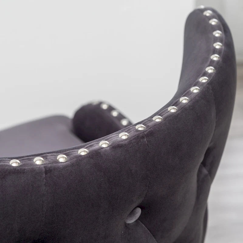 Poltrona d'accento rivestita in poliestere grigio con gambe in legno di gomma