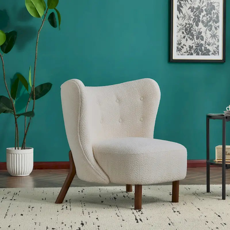 Moderna poltroncina senza braccioli imbottita con seduta morbida e struttura in legno massello