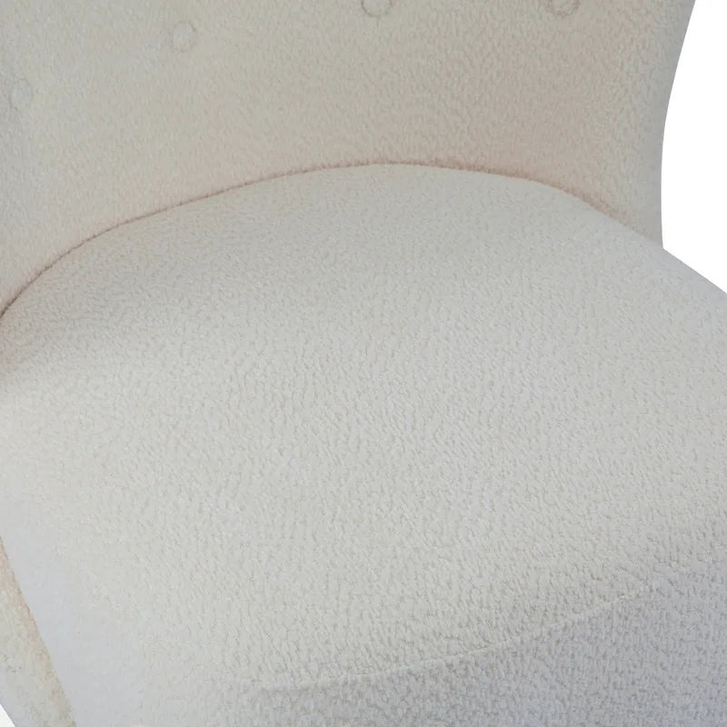 Moderna poltroncina senza braccioli imbottita con seduta morbida e struttura in legno massello